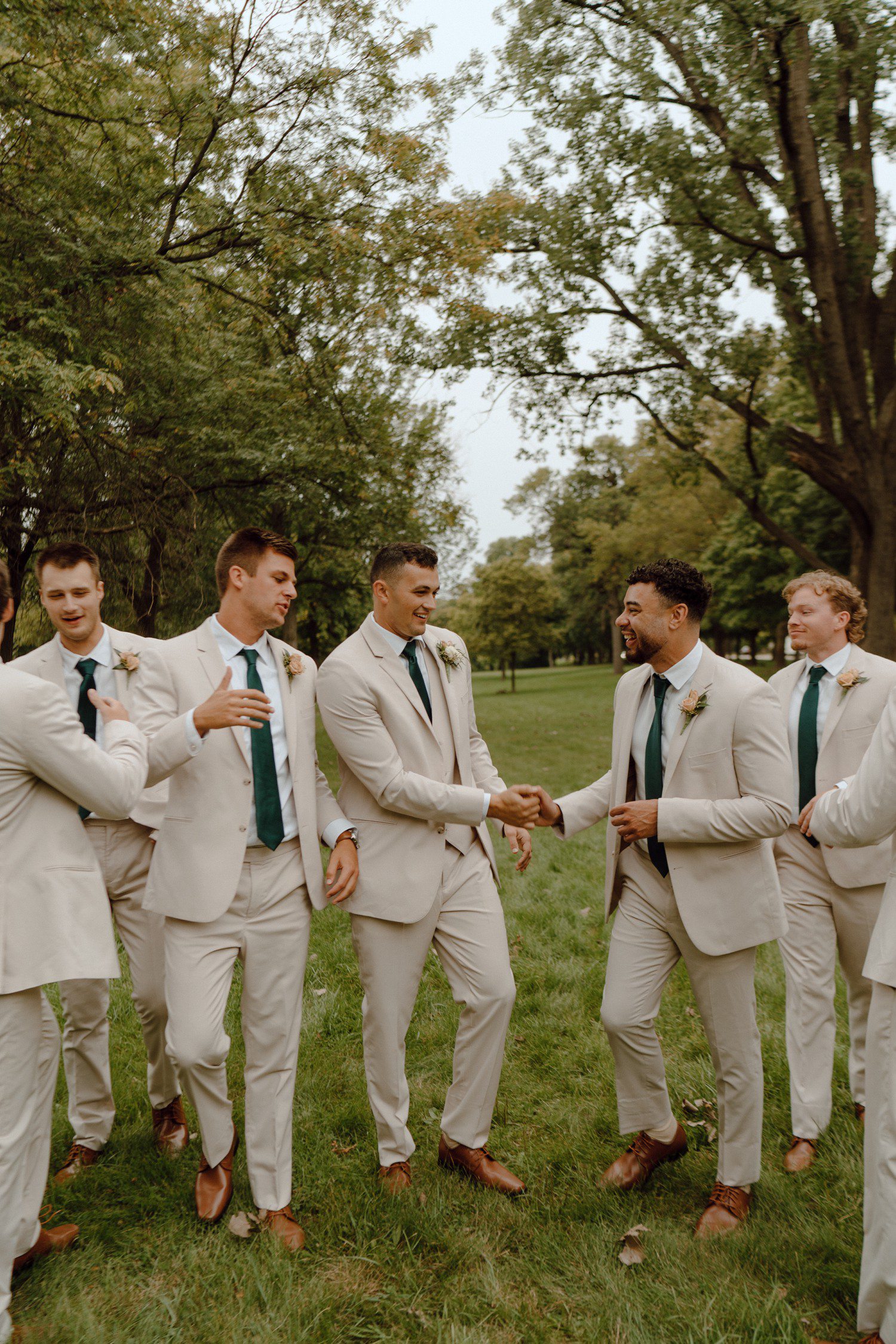 Groom and groomsmen candid photos Grand Rapids.