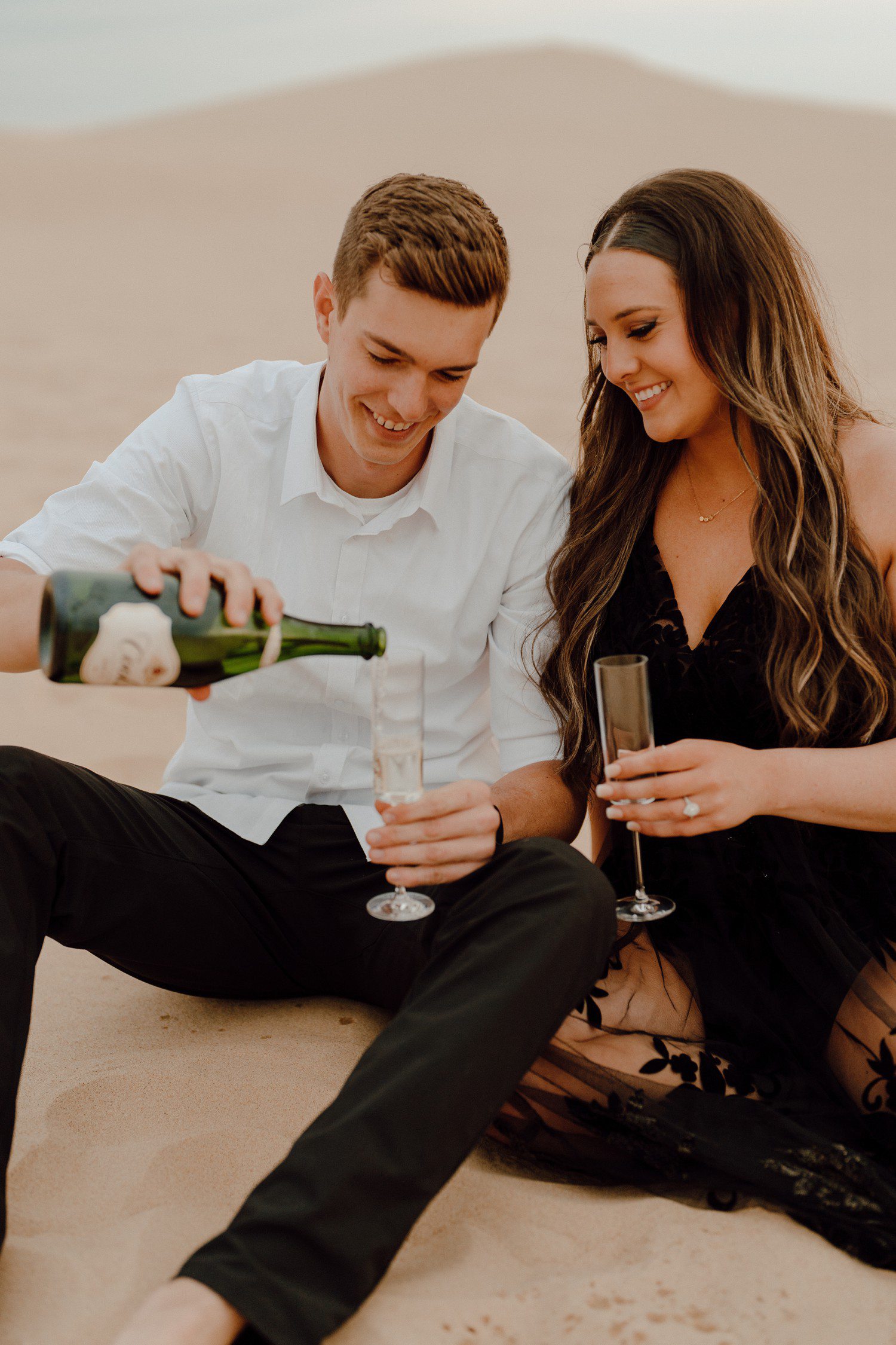 Engagement Photos with Champagne Bottle 