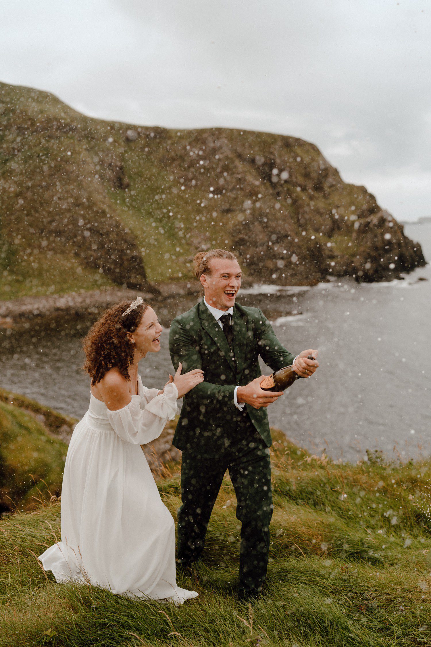 Northern Ireland Elopement Photos Popping Champagne
