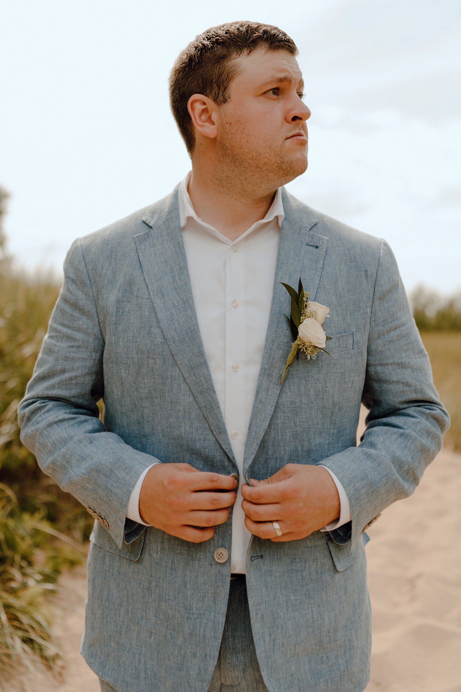 Groom in Light Blue Suit for Wedding