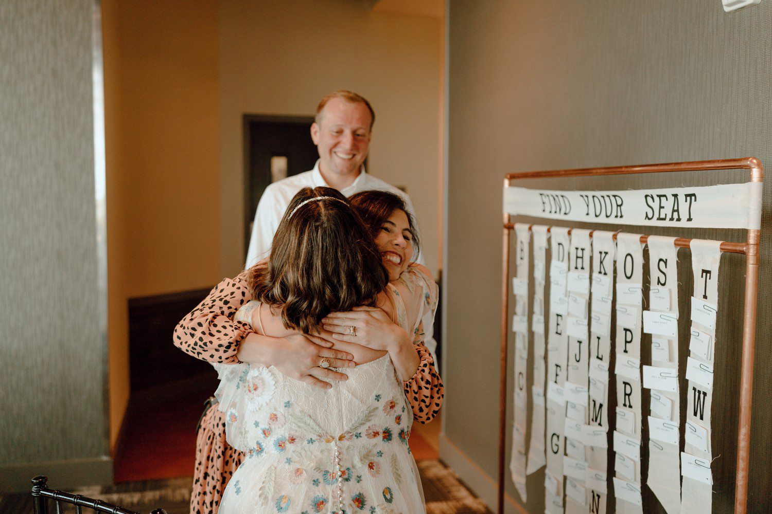 Bride Hugging Wedding Guests
