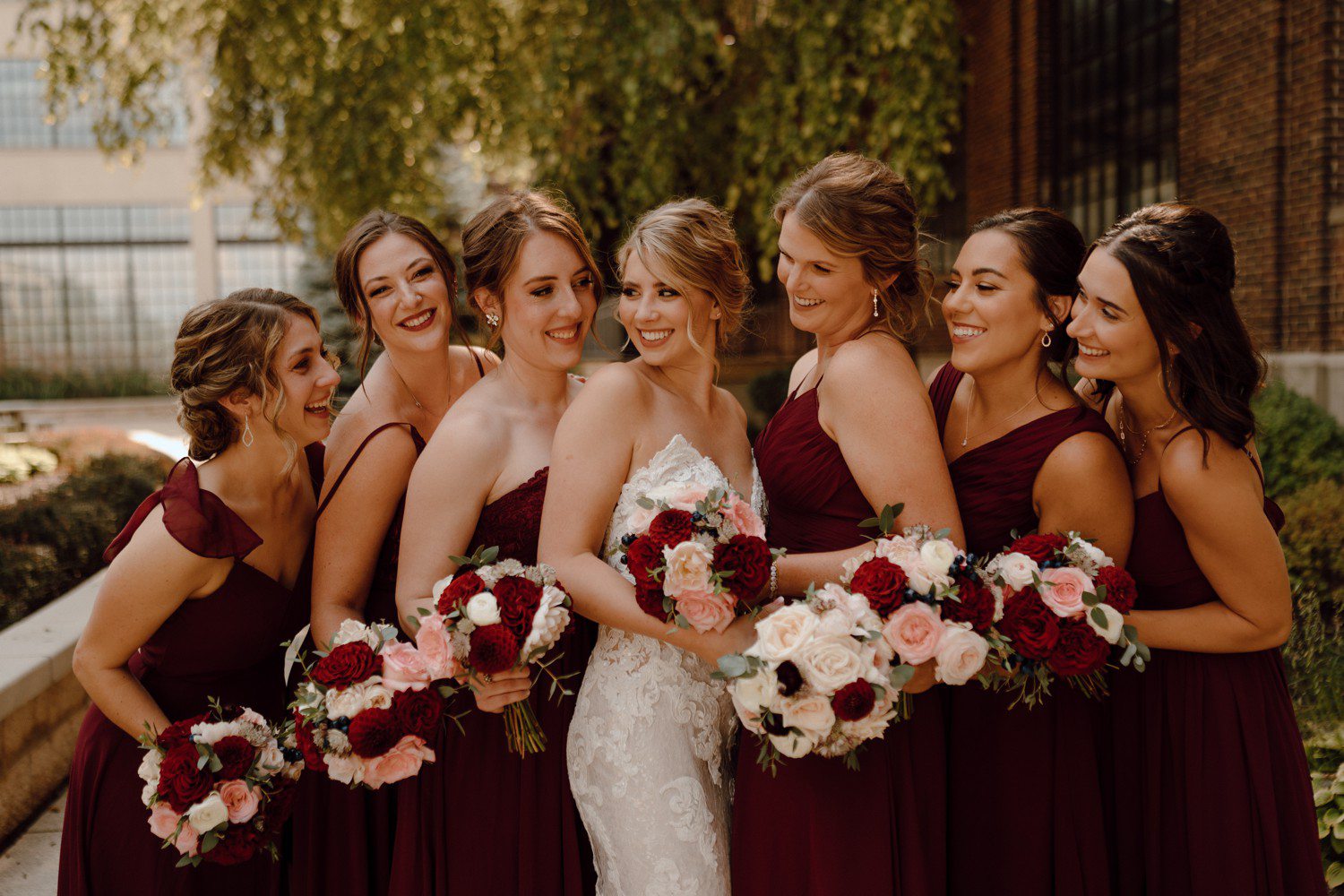 Bride with Bridesmaids in maroon dresses