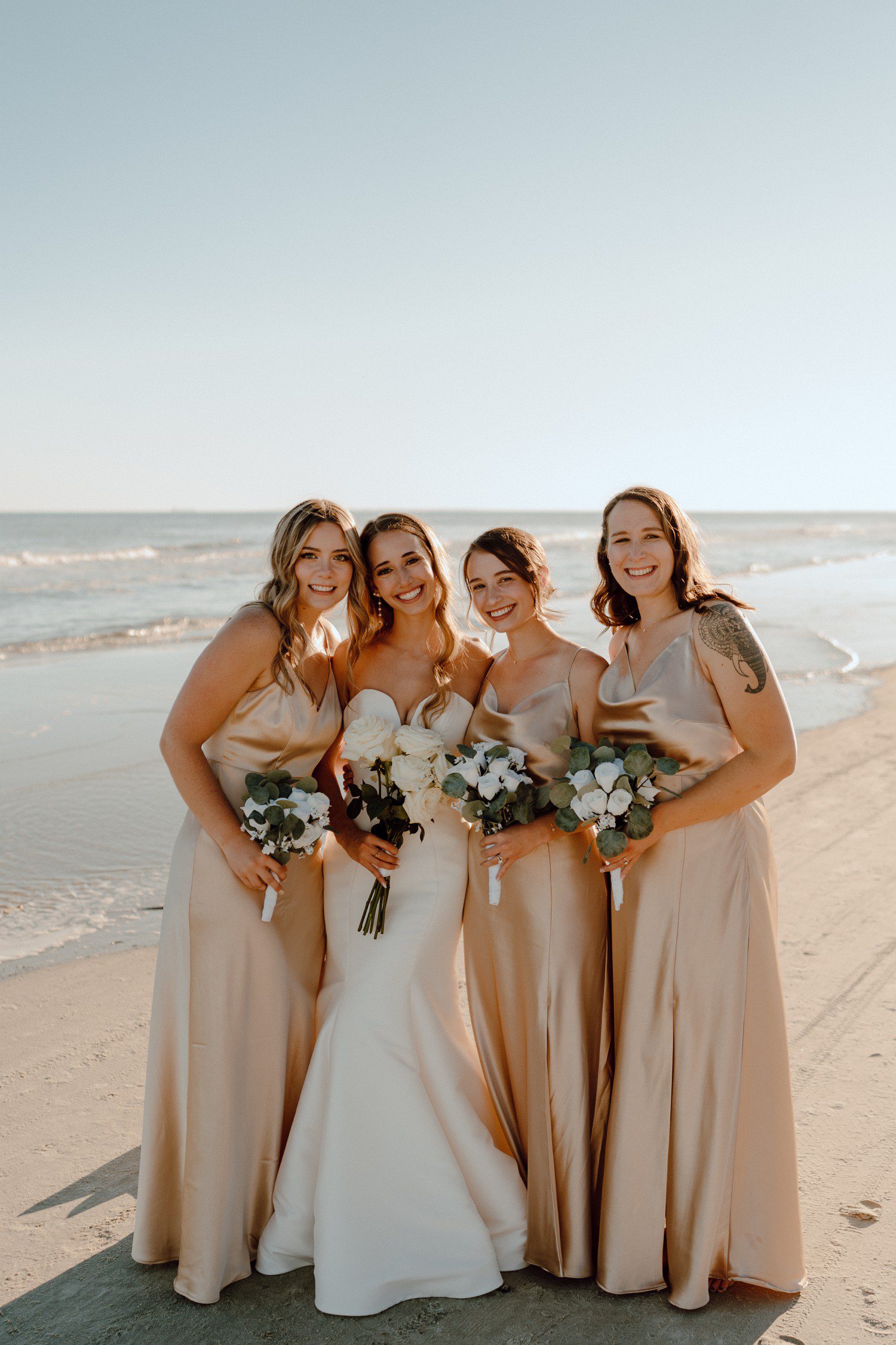 Beach Wedding with Bridesmaids in Champagne Color
