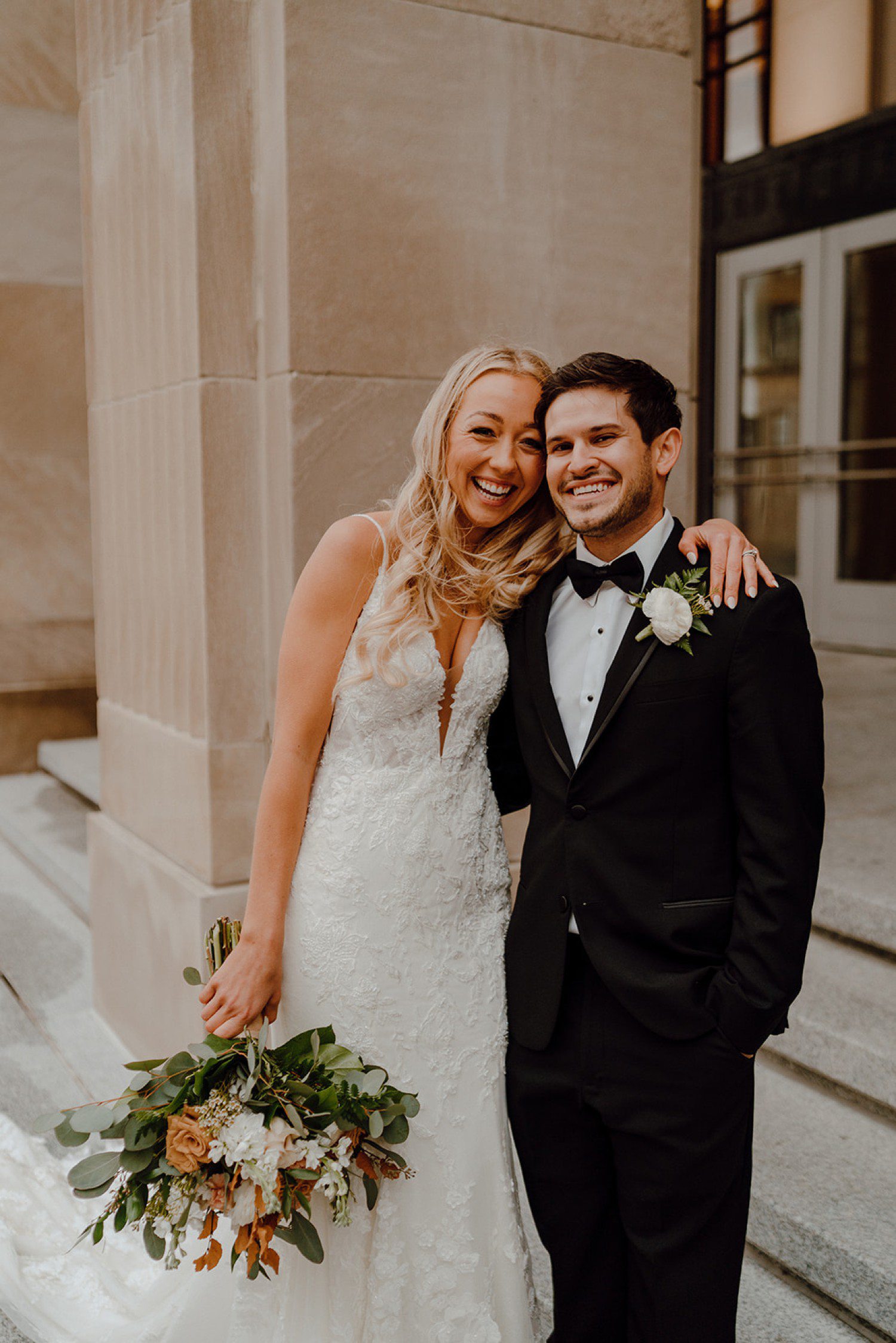 Grand Rapids Wedding Photos with couple smiling 