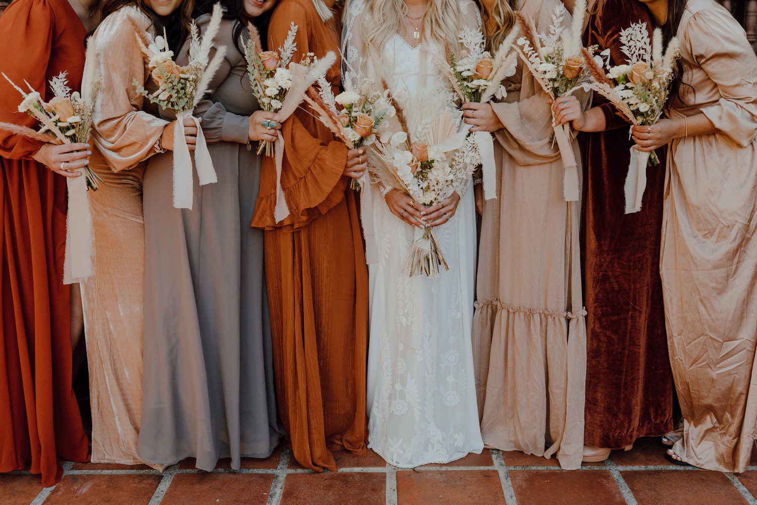 Boho bridesmaids dresses with dried bouquets 