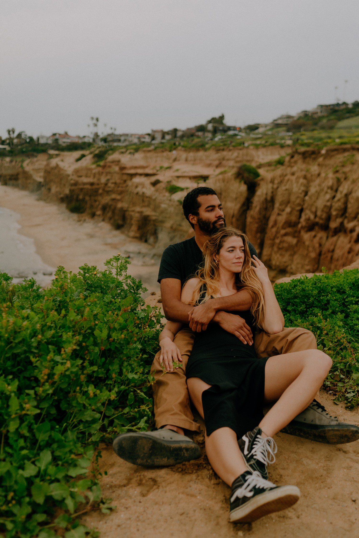 Photos of couple at Sunset Cliffs in San Diego. 