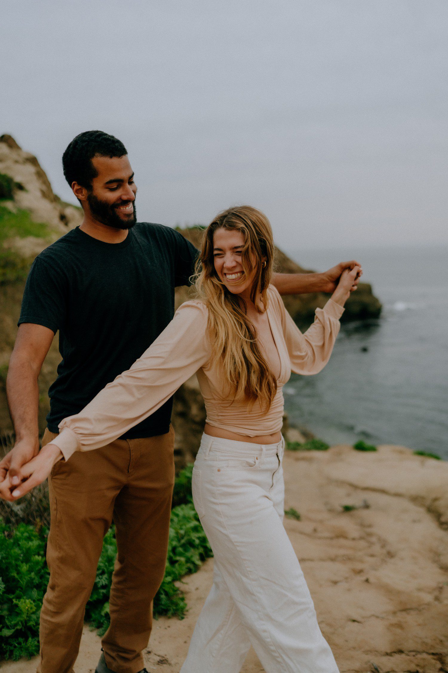 Couples photos at sunset cliffs in San Diego.
