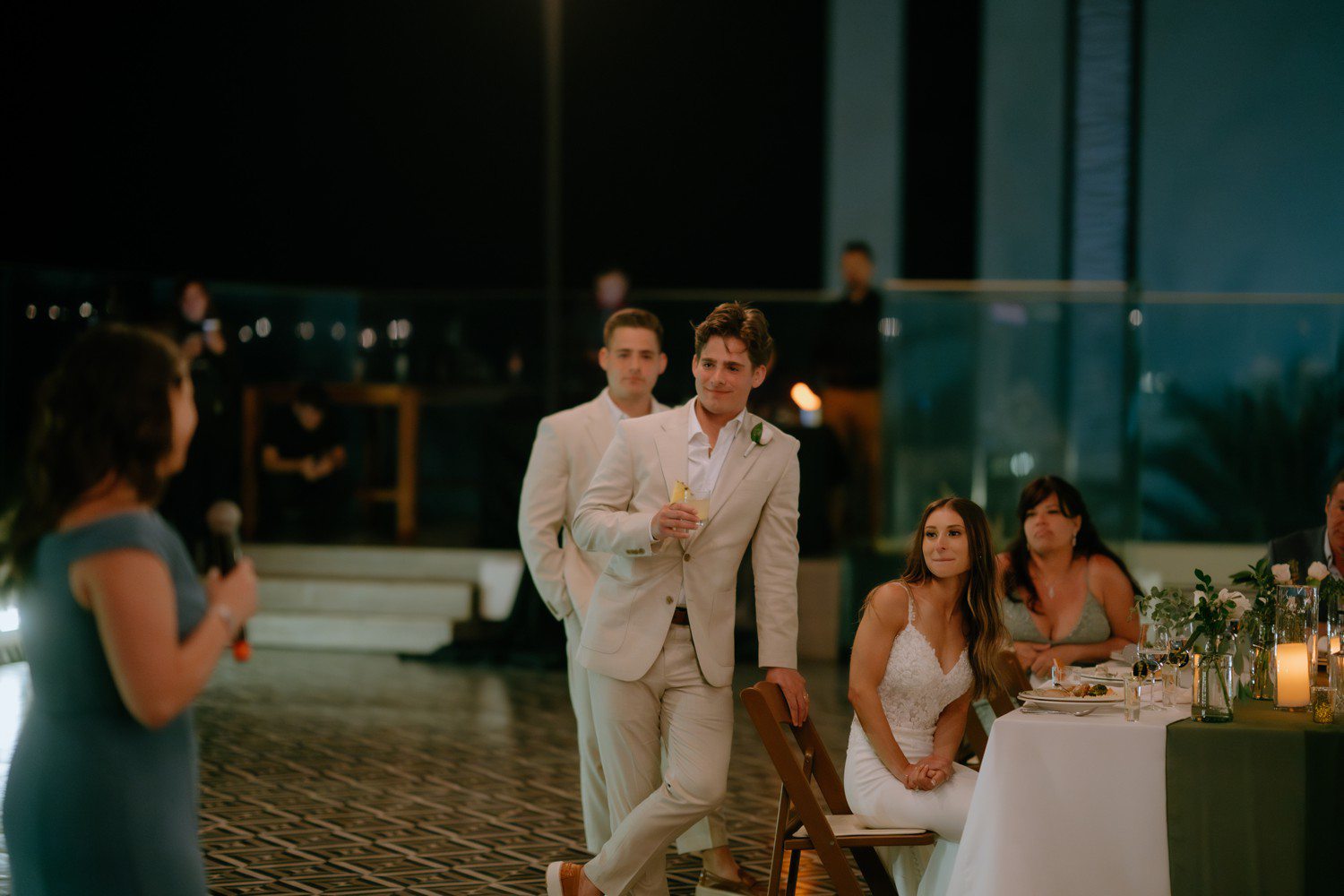Wedding toasts during reception in Los Cabos. 