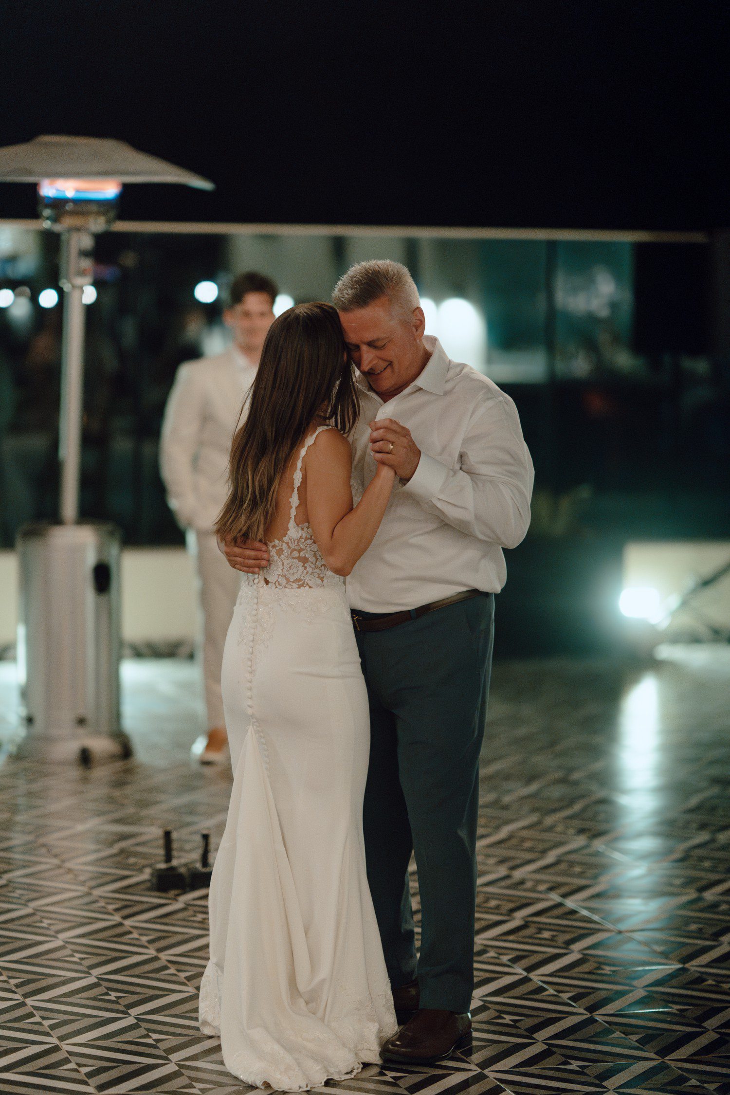 Bride and father first dance during wedding reception. 