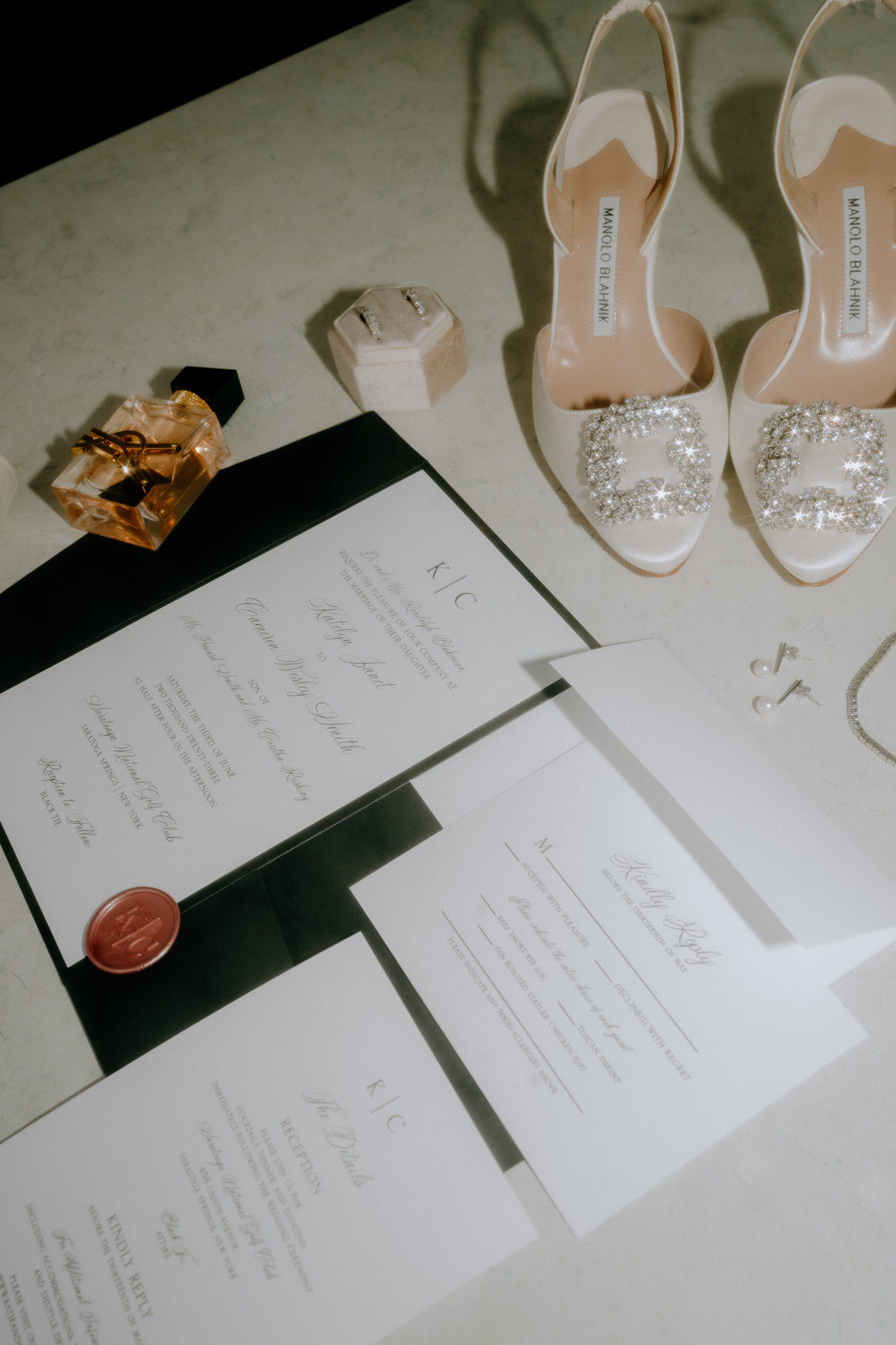 Wedding flat lay details with direct flash. 