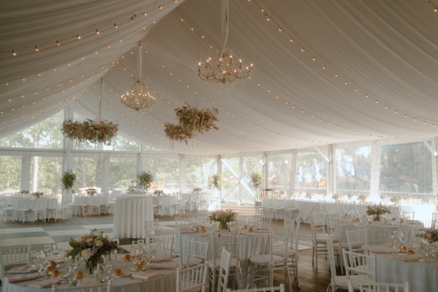 Tented wedding reception decor at Saratoga National Golf Club. 