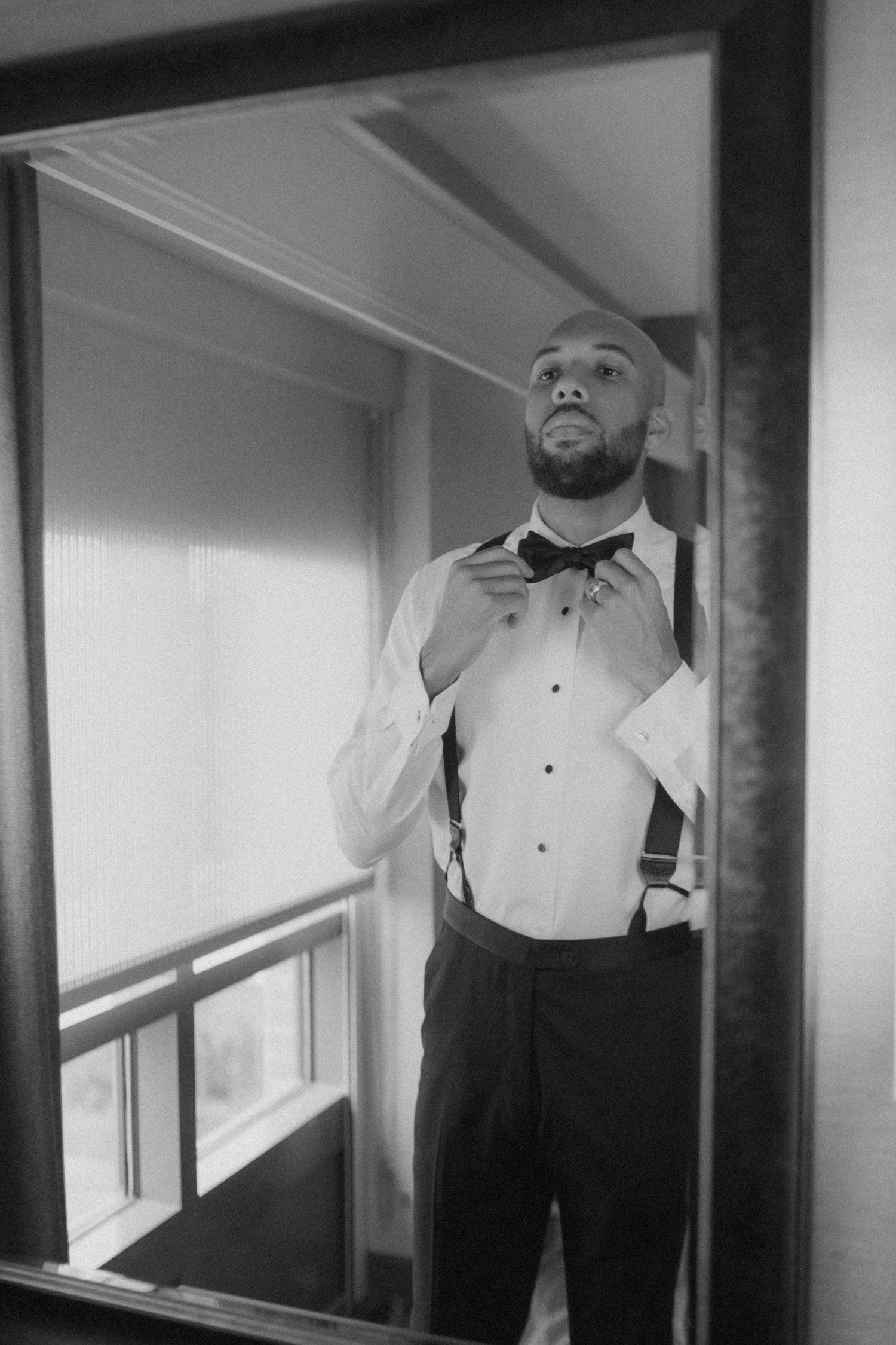 Groom getting ready at the Adelphi Hotel. 