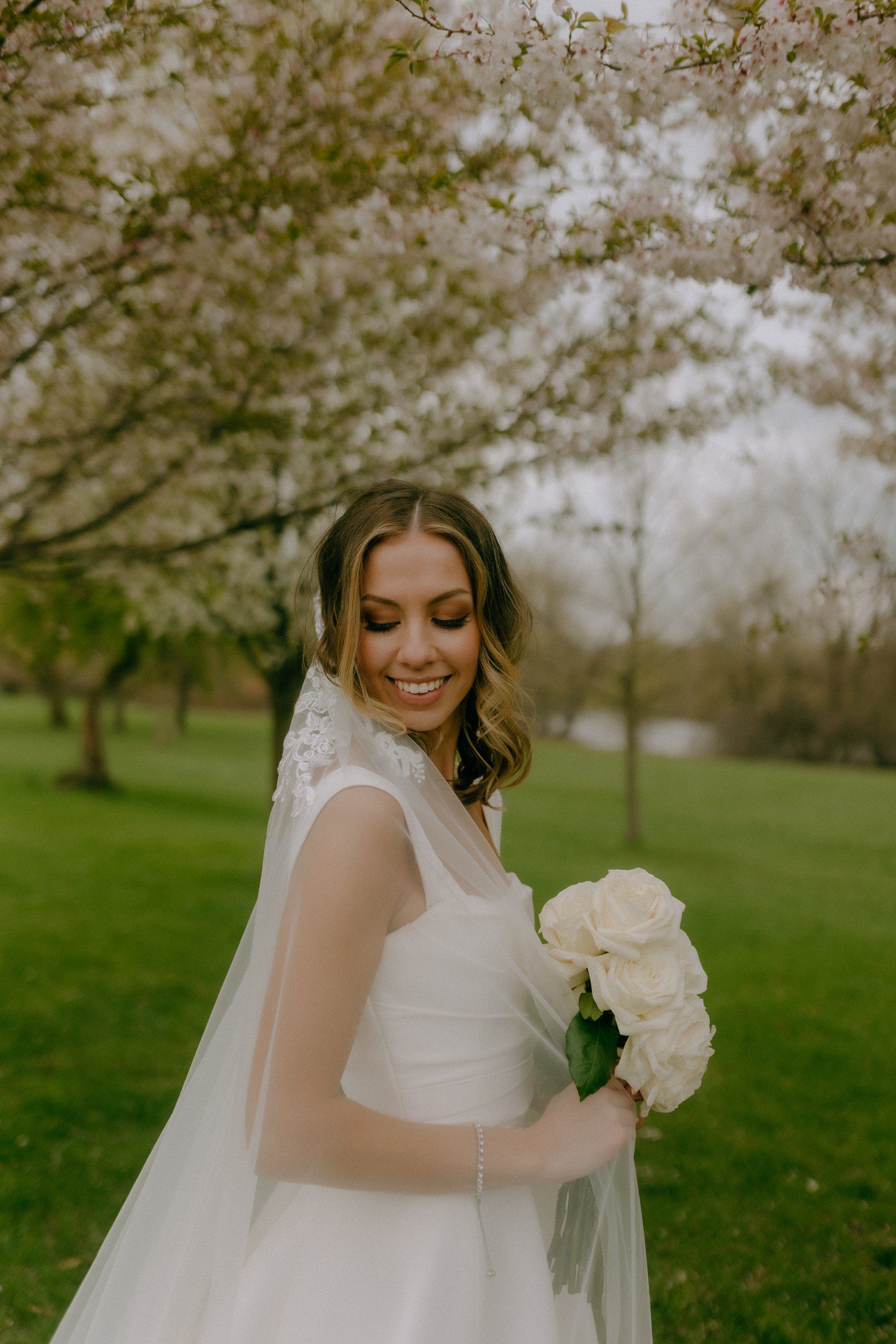 Grand Rapids bridal photos with white bouquet. 