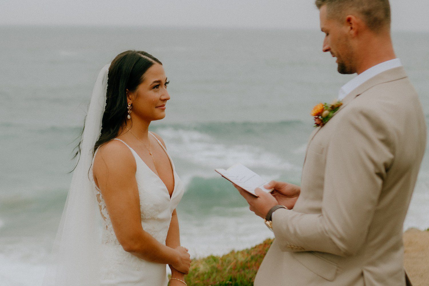 Emotional vows during Big Sur elopement. 