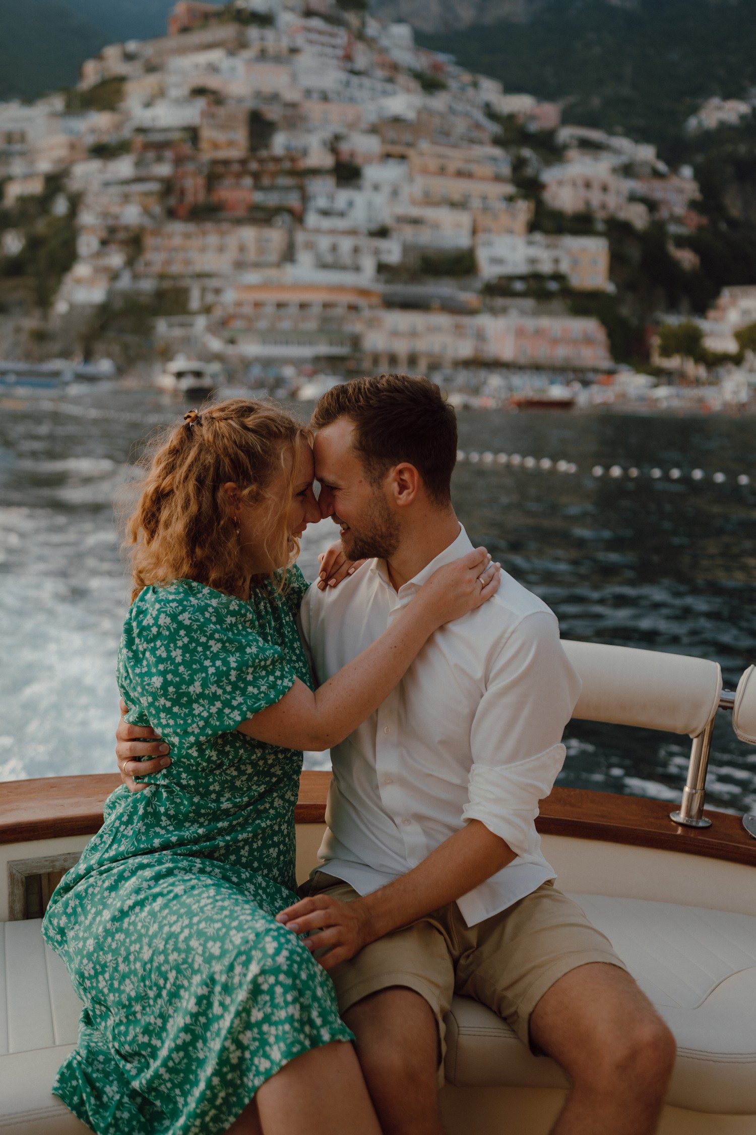 Couple on a boat for engagements in Positano Italy. 