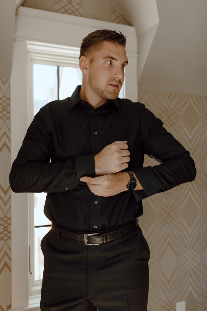 groom getting ready for the wedding ceremony