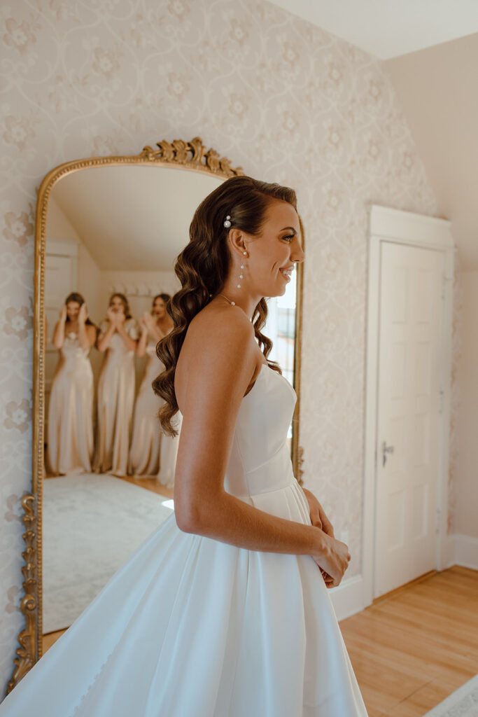 bride and bridesmaids first look