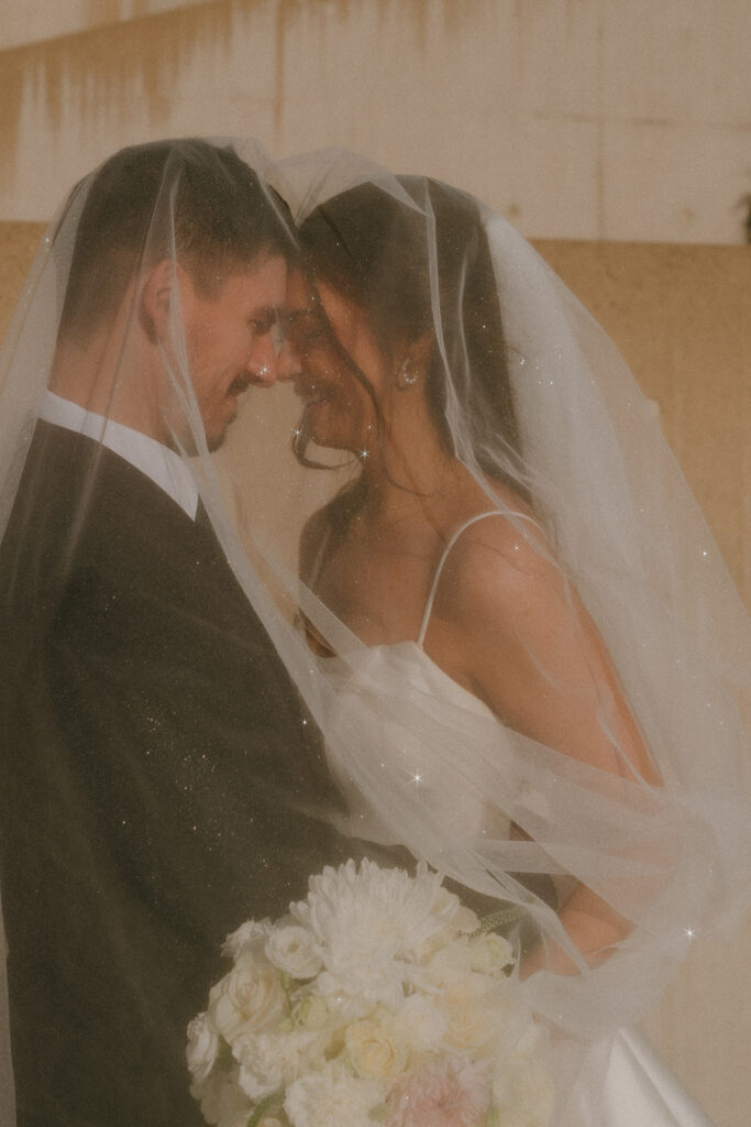 bride and groom looking at each other