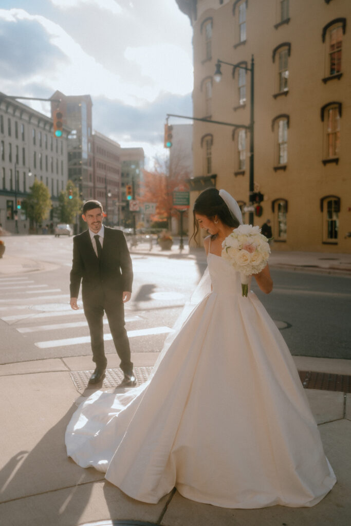 bride and groom walking around downtown michigan