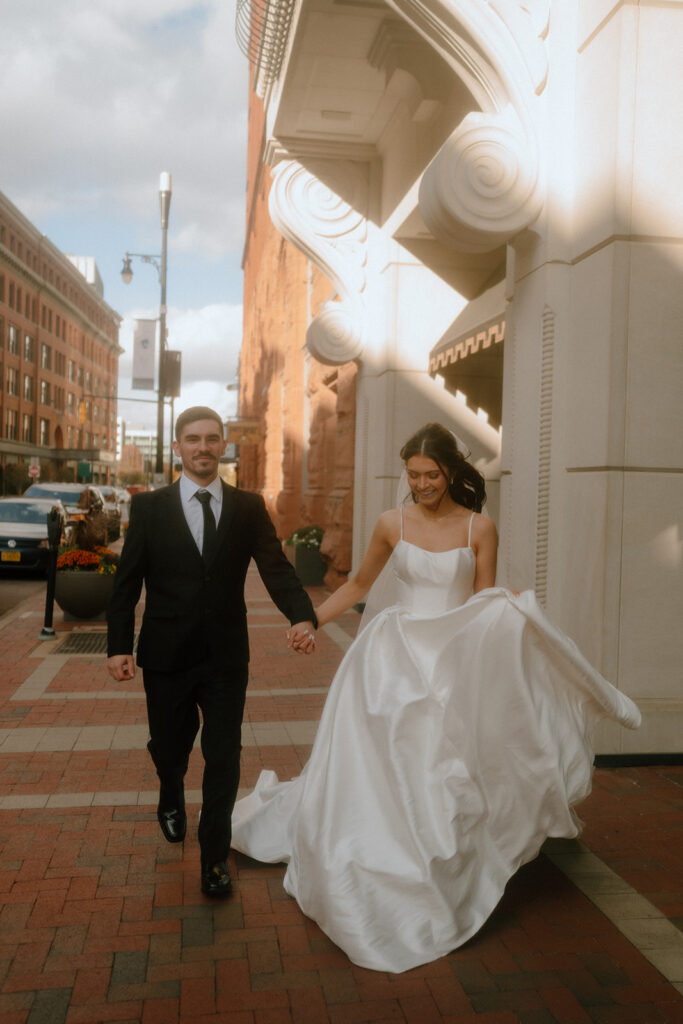 bride and groom at their fun downtown elopement session