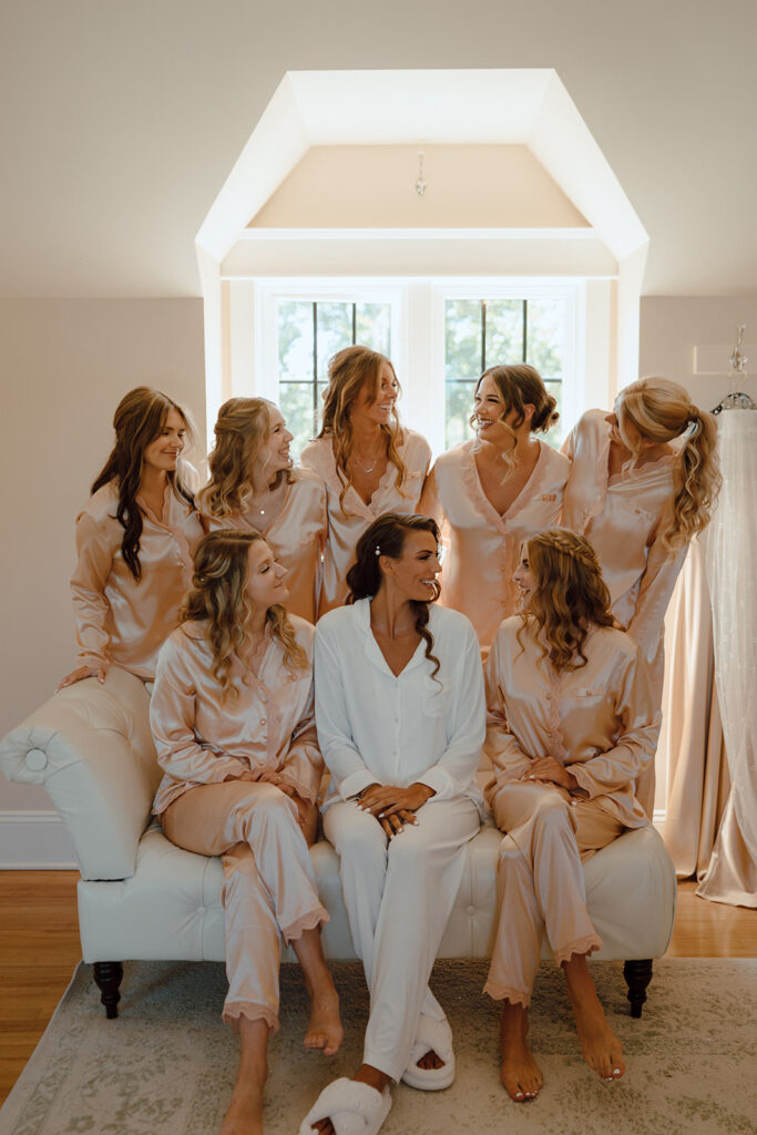 bride and her bridesmaids before getting ready for the wedding ceremony