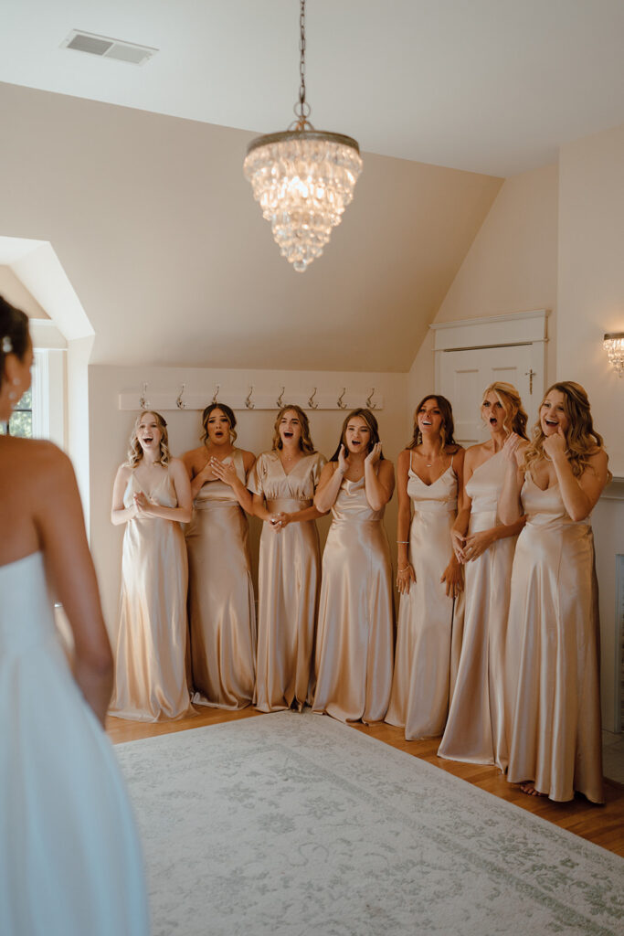 bride and bridesmaids first look