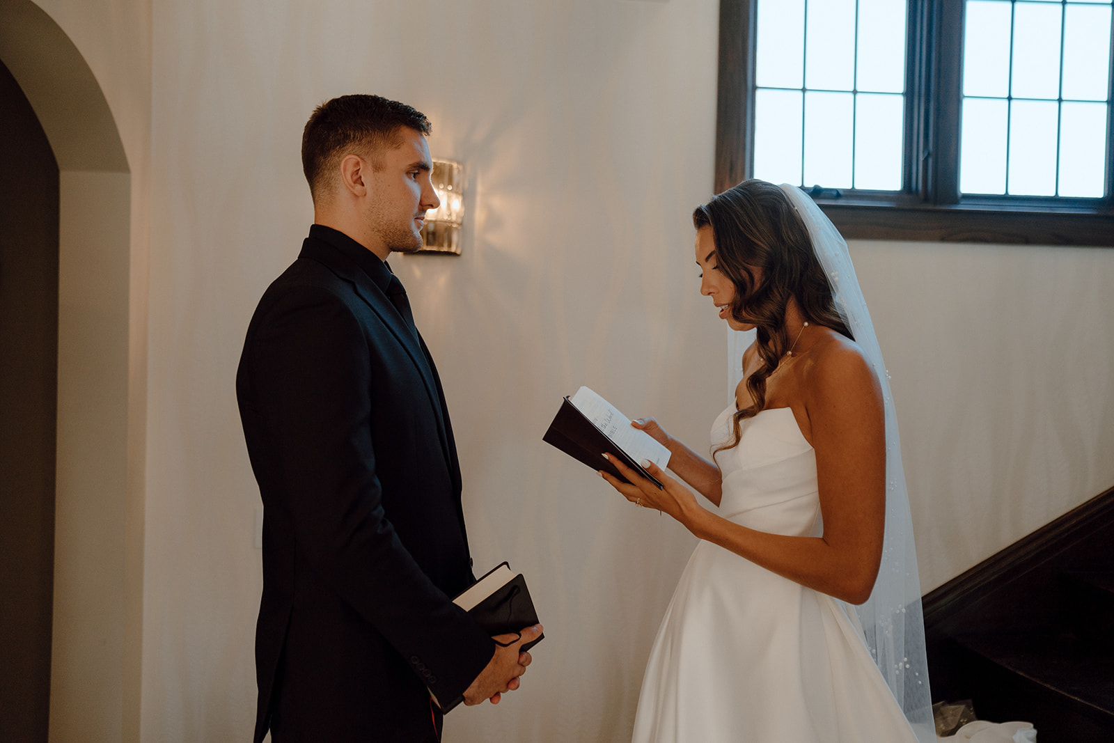 happy couple exchanging their vows before the wedding ceremony