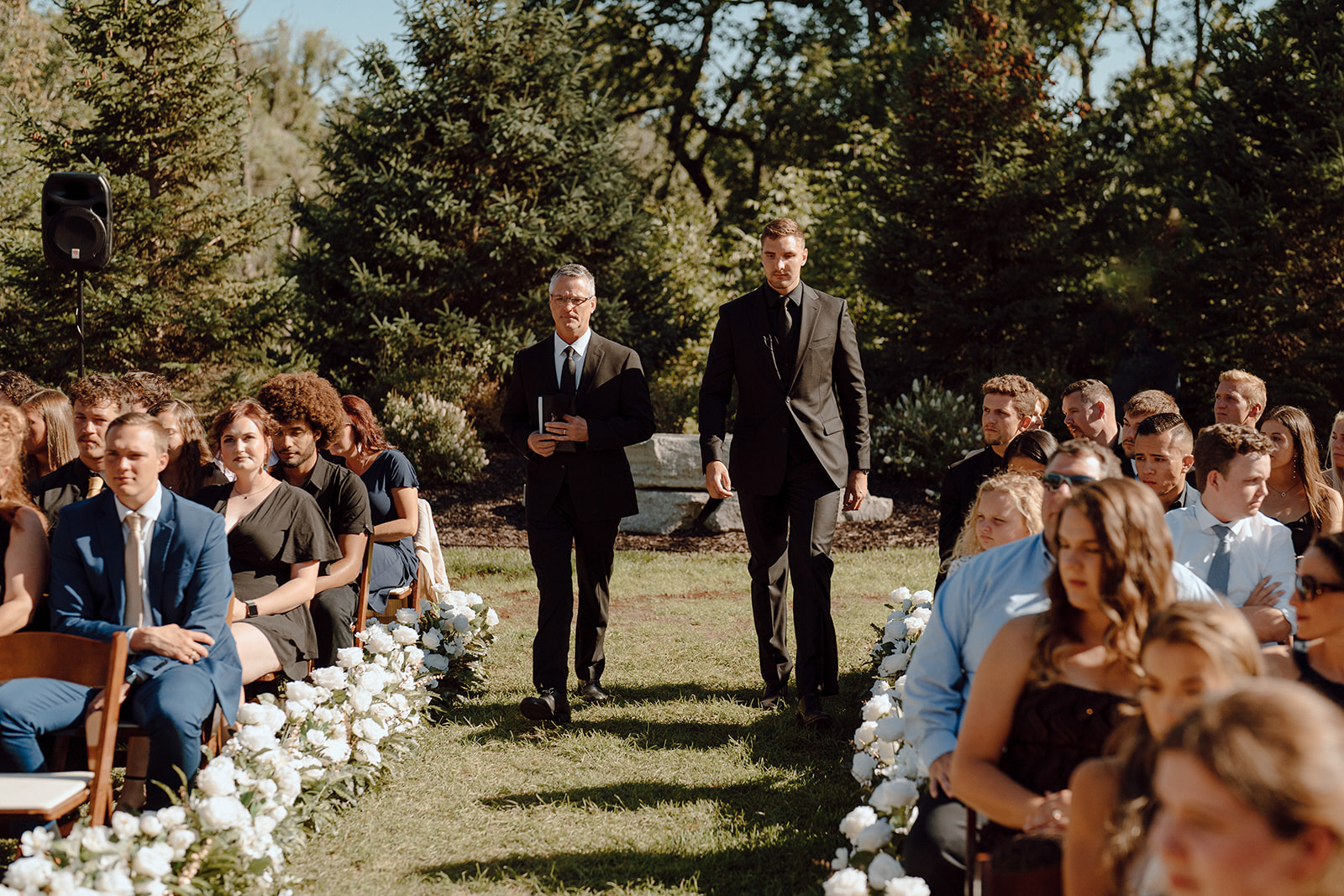 groom walking down the aisle