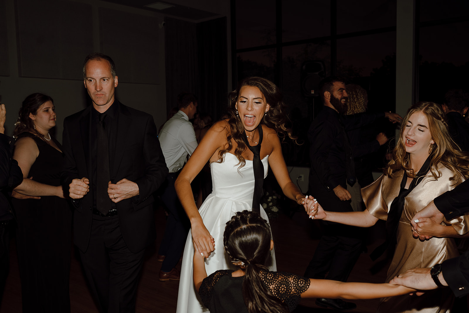 bride dancing with their wedding guests