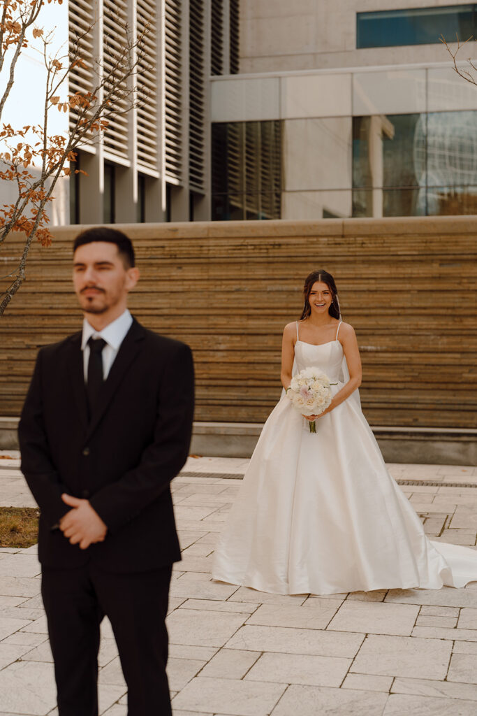 bride and groom before their first look at their Fun Downtown Elopement