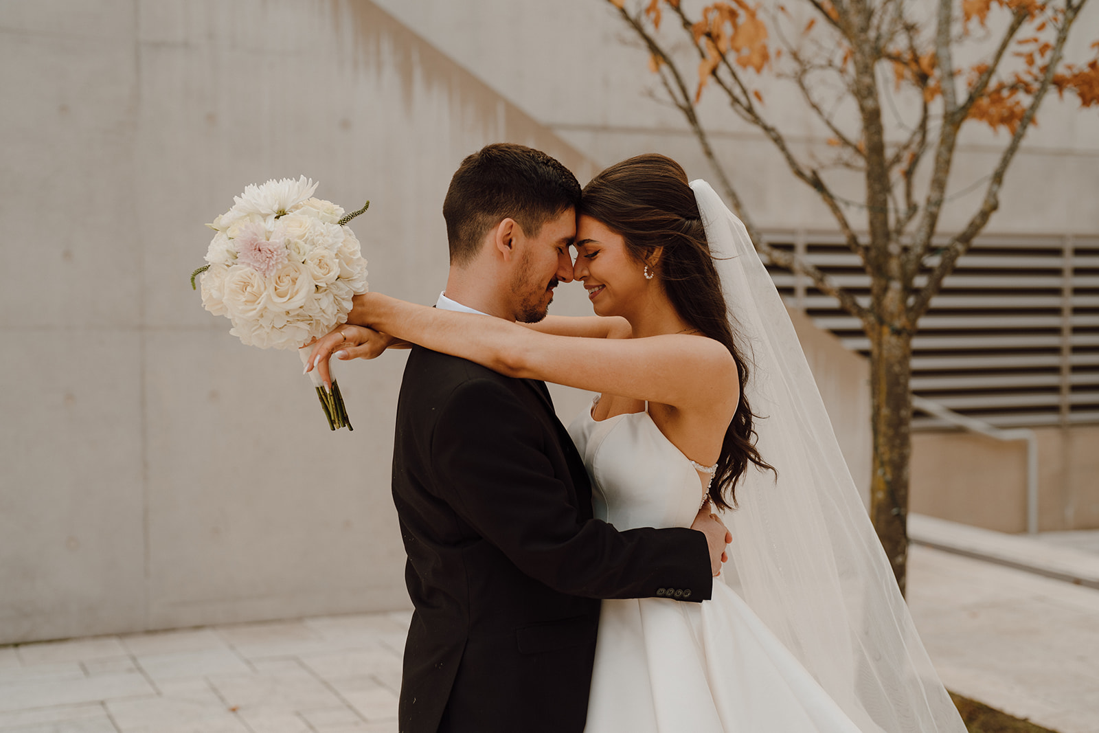 cute couple hugging at their fun downtown elopement