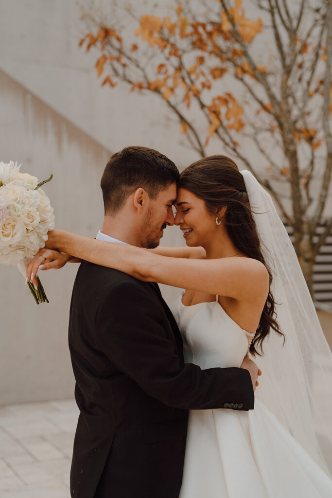 bride and groom looking at each other