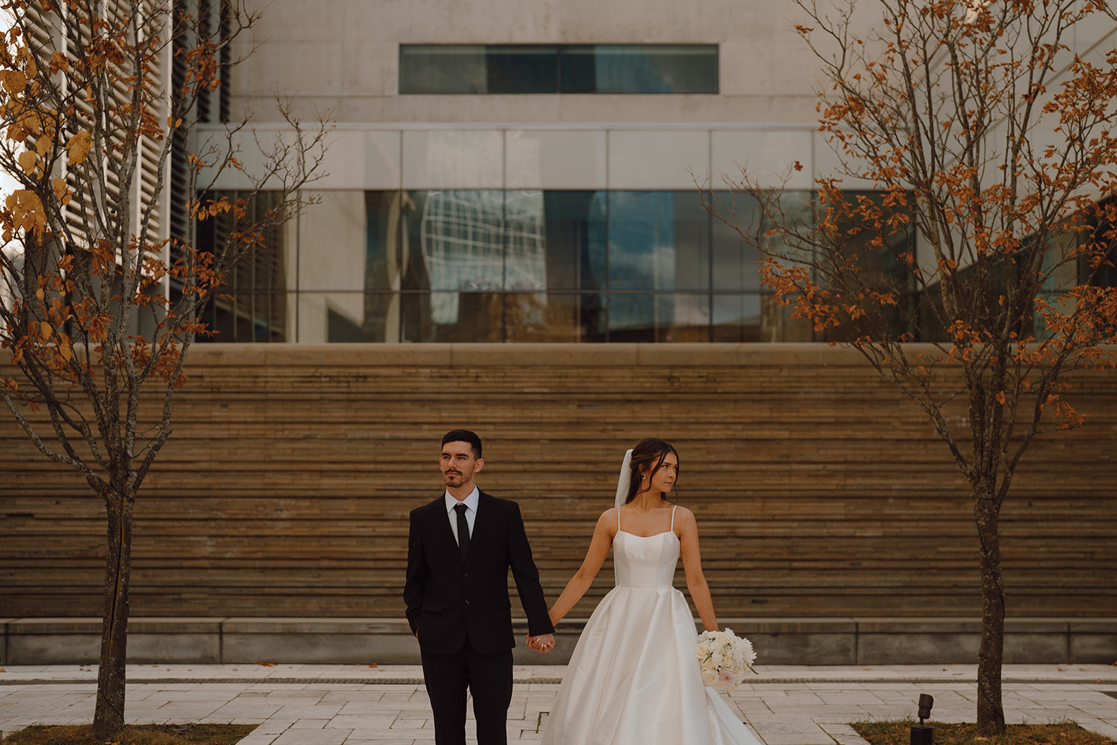 bride and groom holding hands during their bridal photoshoot