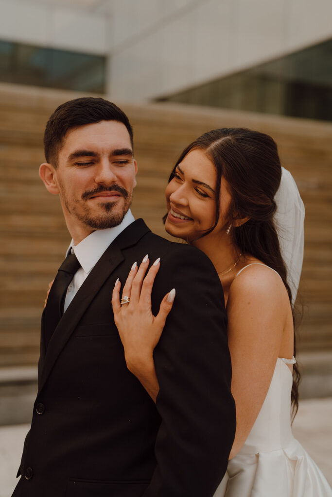 bride and groom looking at each other