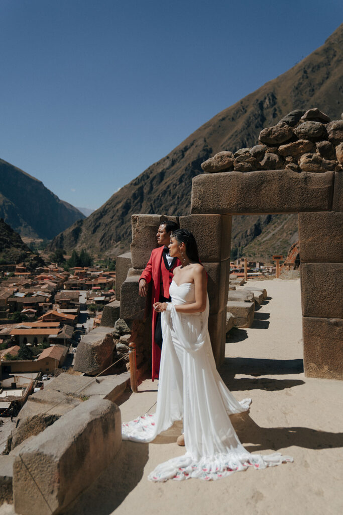 bride and groom looking at the landscapes during their photoshoot