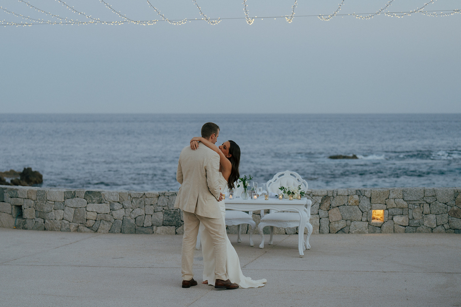 bride and groom dancing at their wedding reception