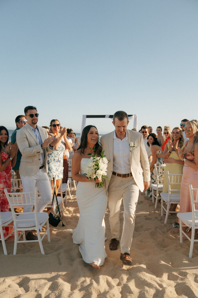 bride and groom heading to their wedding reception