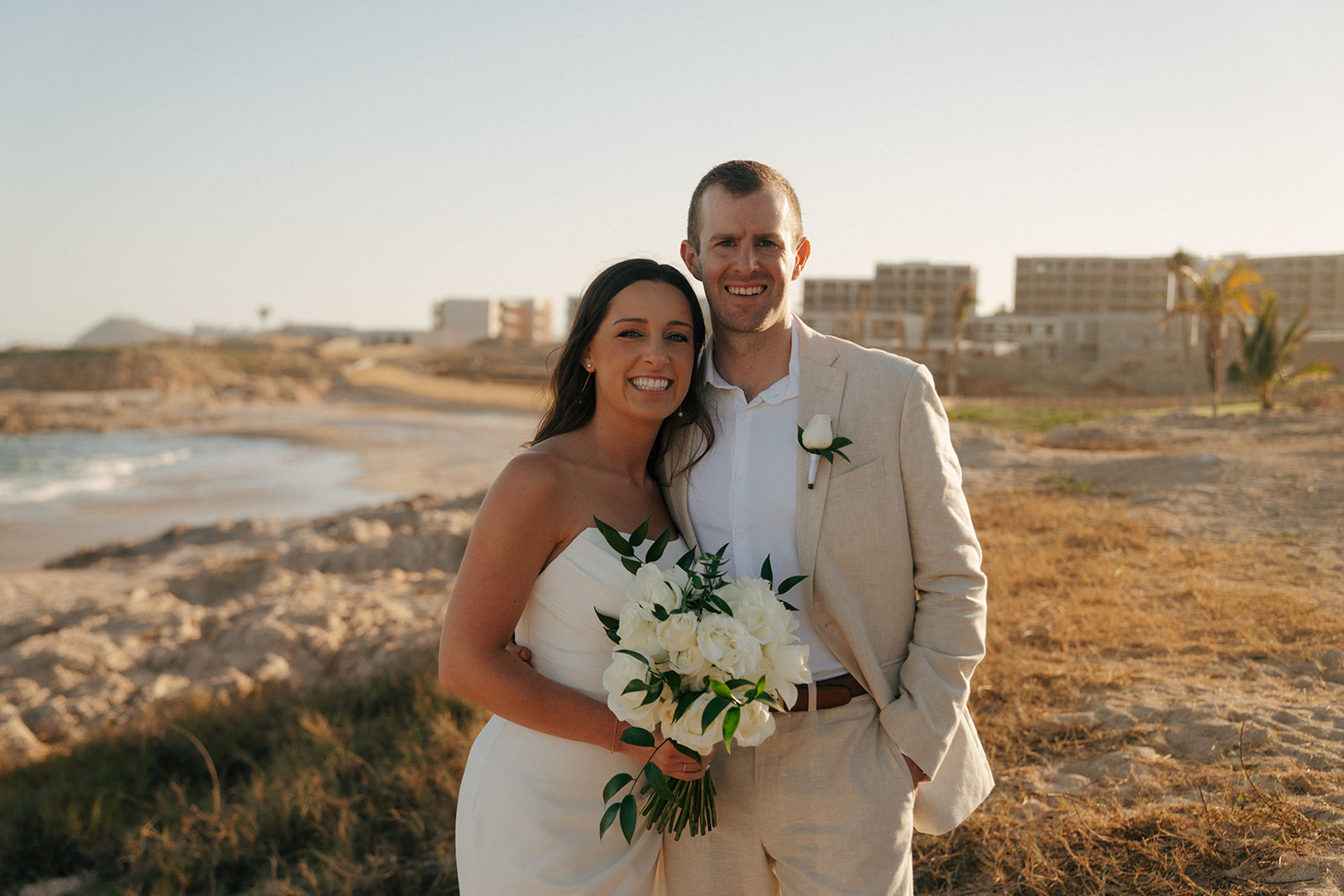 cute portrait of the bride and groom at their timeless summer wedding