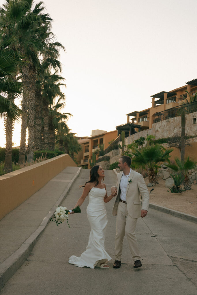 bride and groom dancing at their timeless summer wedding