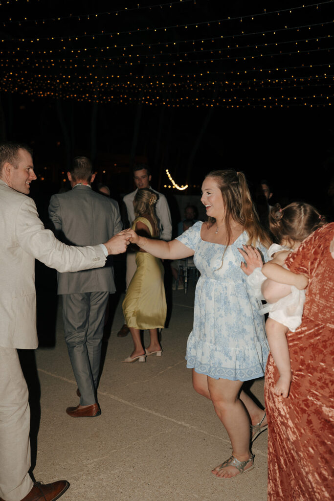 guests dancing at the timeless summer wedding