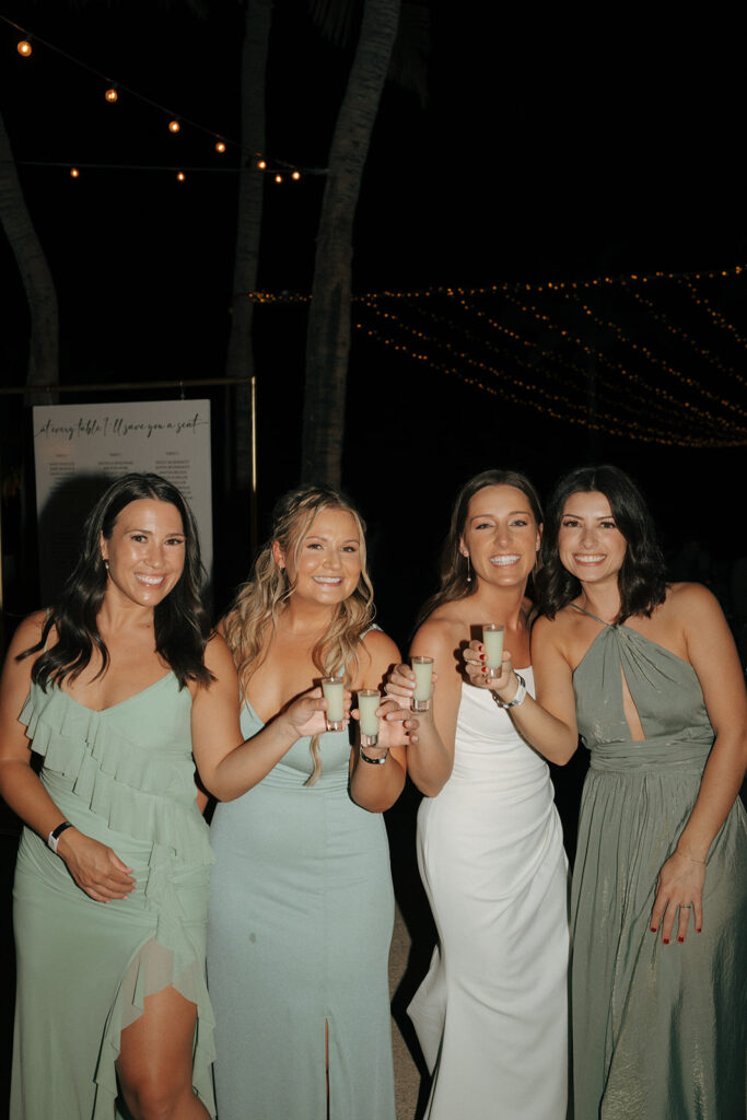 bride and her bridesmaids at her wedding reception