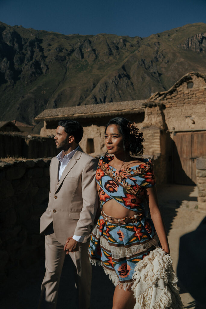 couple walking around machu picchu