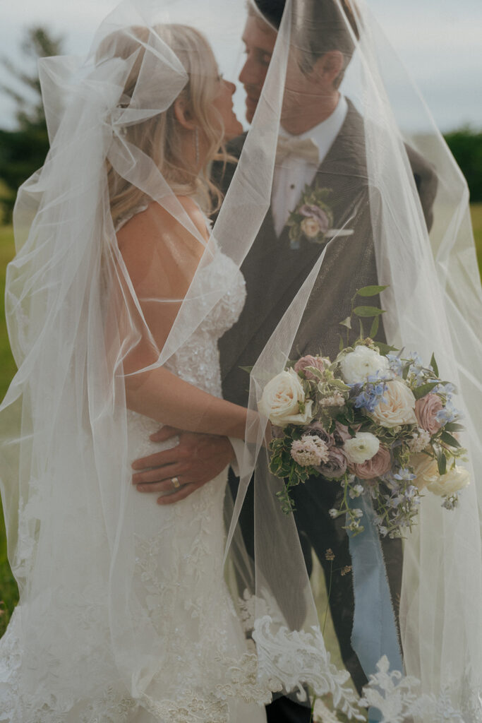 bride and groom at their colorful wedding