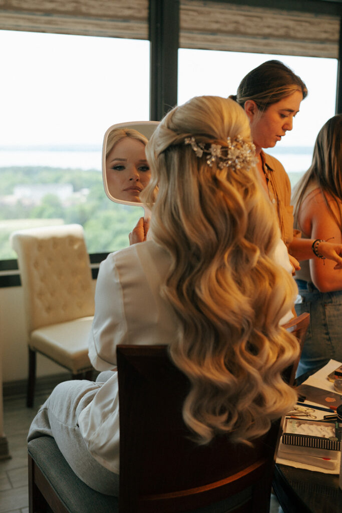 bride getting ready for her colorful wedding