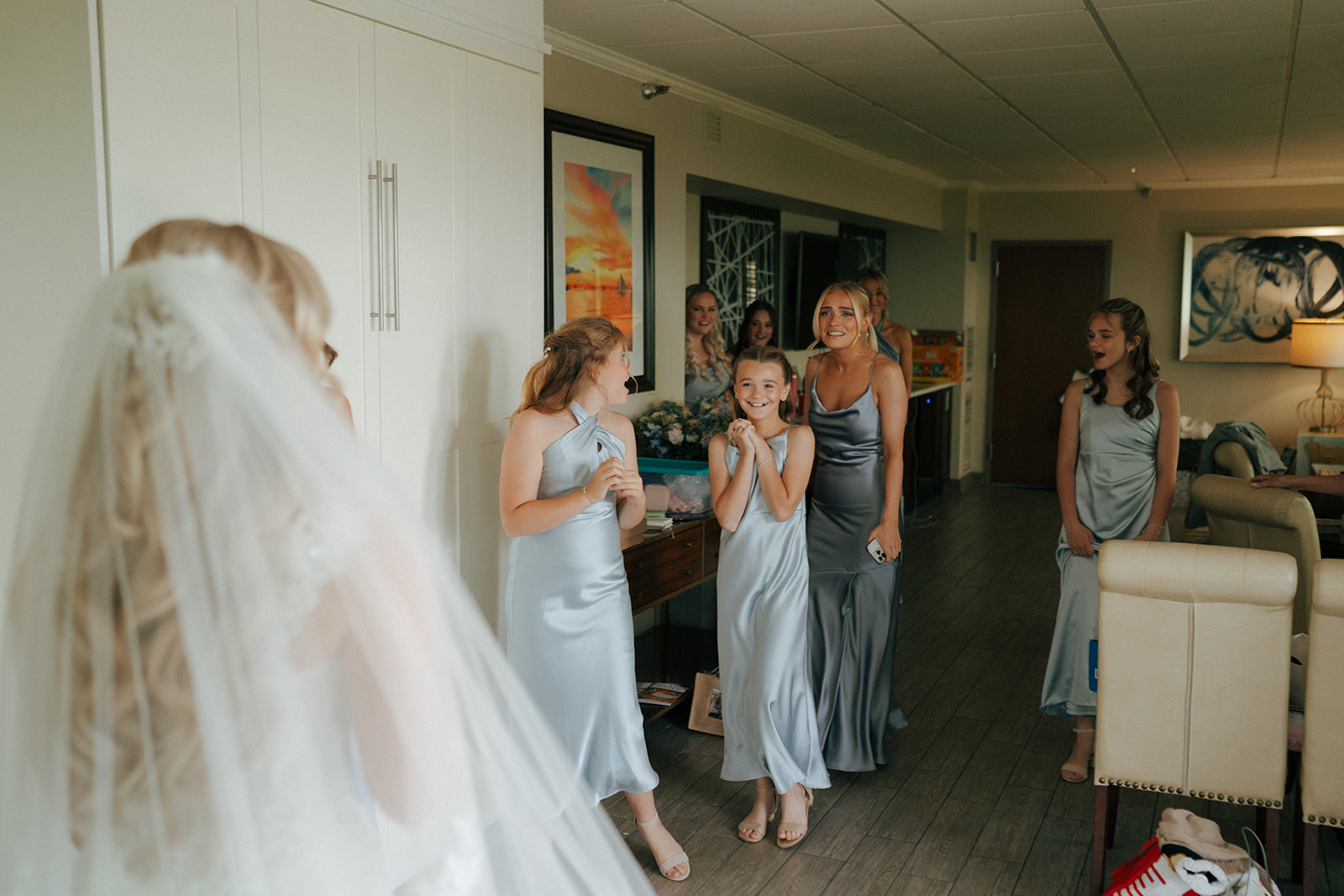 bride and her bridesmaids first look