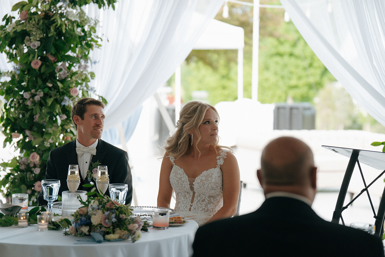 bride and groom during their wedding speeches