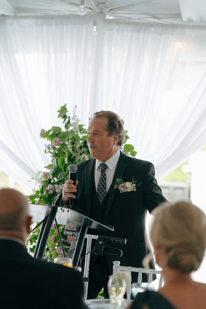 father of the bride giving his speech at the wedding