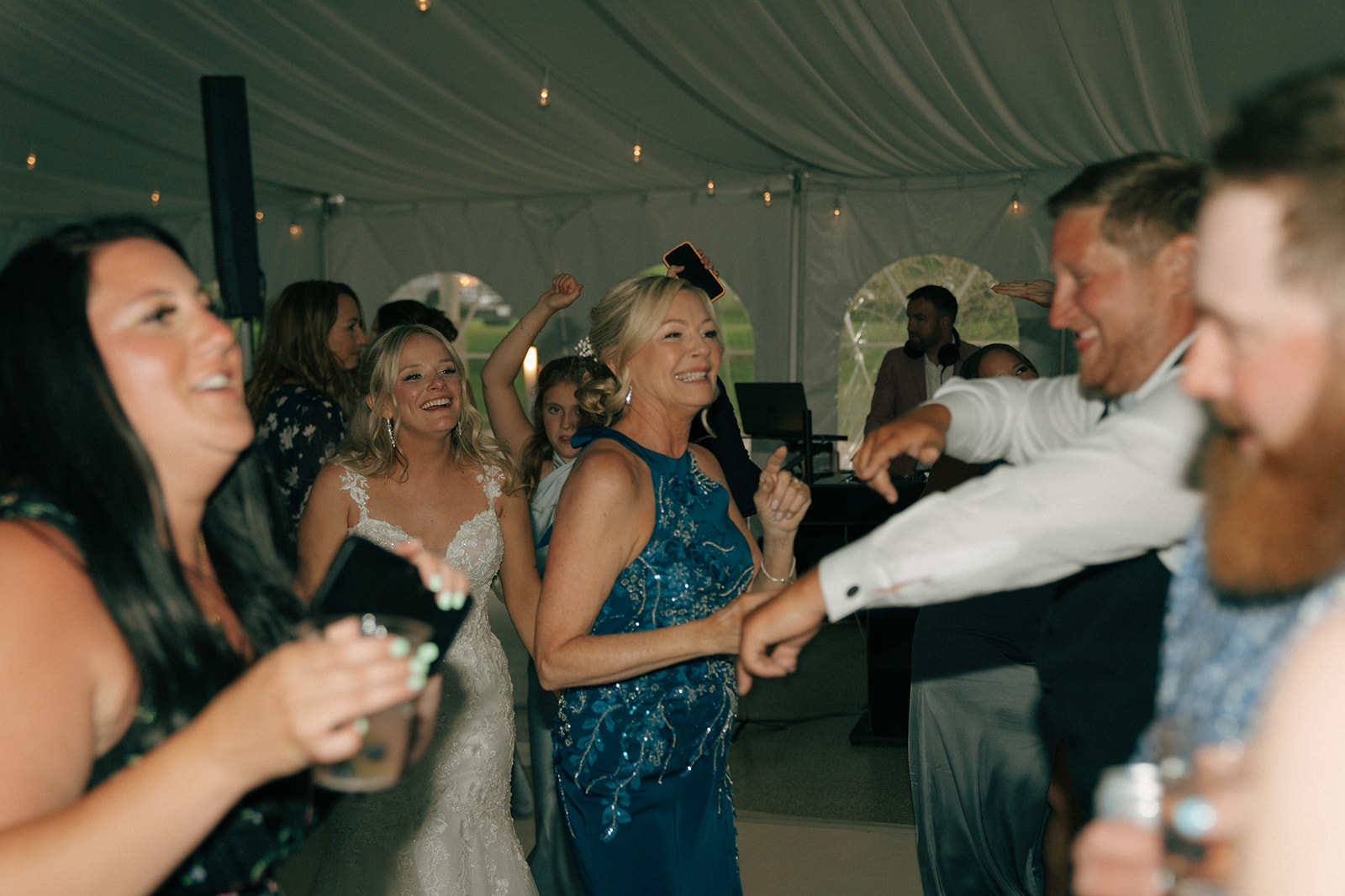 guests dancing at the colorful wedding reception