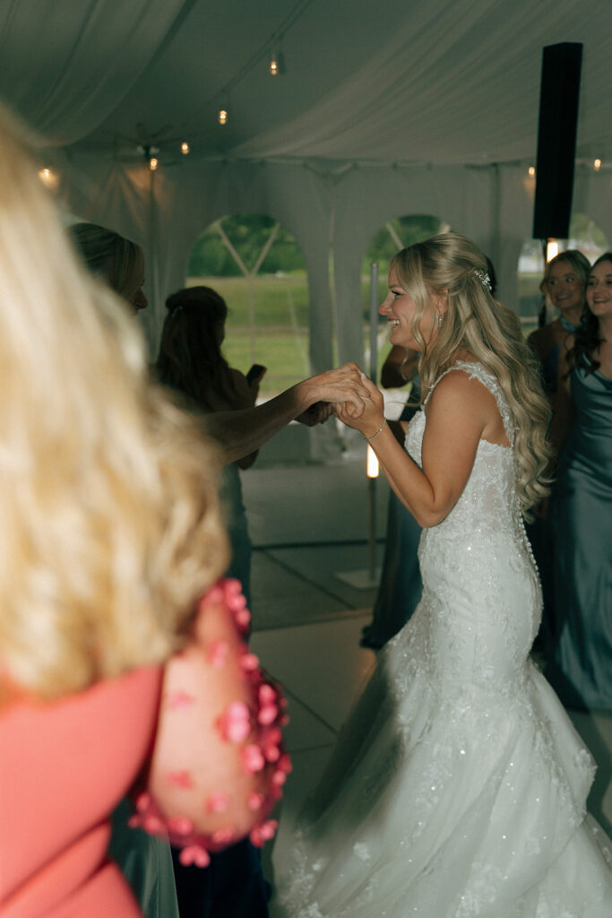 bride dancing at her wedding reception