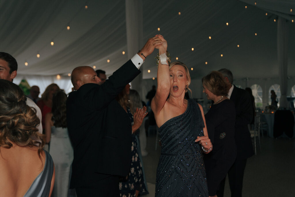 guests dancing at the wedding reception